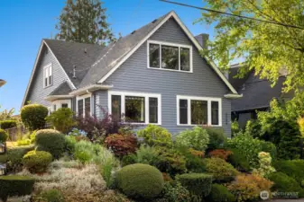 Welcome to this beautifully restored 1928 Craftsman nestled on a quiet street in Magnolia.