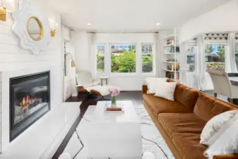 Step inside to a bright and airy main floor featuring a spacious living room & formal dining area.