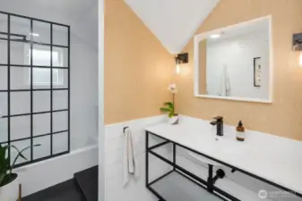 Upstairs, you’ll find two spacious bedrooms, a full bath, and ample storage.