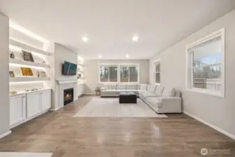 Enormous living room with gas fireplace & built ins