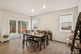 Large dining room with slider out to the covered patio