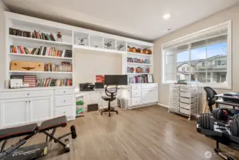 Main floor office with built ins including trim lights