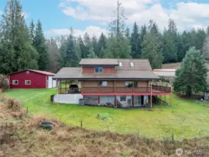 Back of house with basement