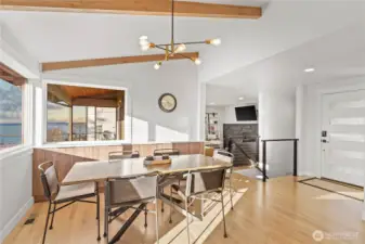 Dining room with custom built in buffet, with roll out shelving, designed to take in the views
