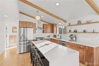 Who doesn't love beams, work space and a sleek modern kitchen?