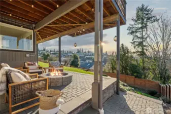 Another look to this outdoor living space, a paver walk way is extended to the front yard!