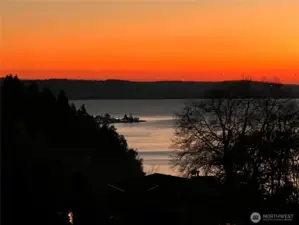 This breathtaking Puget Sound sunset captures the essence of Northwest living—expansive water views, the silhouette of the Olympic Mountains, and a sky painted in vivid, unforgettable color. Once featured as the Seattle Times “Home of the Month” in 1958, this property continues to embody the timeless beauty and serenity that defined its original acclaim. From glowing horizons to the peaceful reflection of the Sound, every evening feels like a private masterpiece unfolding right outside your door.