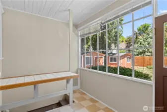 Sunroom off kitchen with basement access