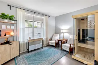 Mainfloor office is graced with French doors.  Currently being used as a sauna room for ultimate relaxation