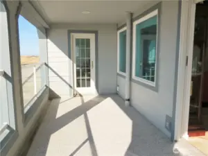 THE DECK IS THE FULL LENGTH OF THE CONDO FOR MULTIPLE GUEST SEATING TO WATCH THE WHALES AND WILDLIFE MIGRATING!  THE DOOR AT THE END IS A WET BAR!