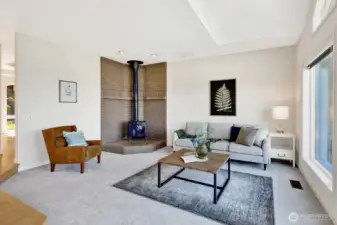 Family room features a wood stove
