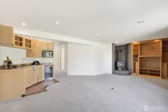 The lower level primary bedroom is large and has access to the backyard through the bathroom
