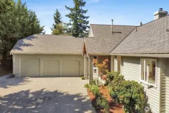3-car garage with ample parking outside too