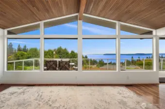 A gallery of windows framing the vistas.
