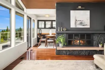 Striking accent wall with wood-burning fireplace.
