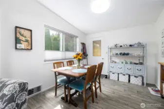 The dining room with access to the backyard/garage.