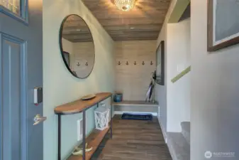 Unit A features an EV charger just outside.  Now, let's step inside Unit A - the upper unit.