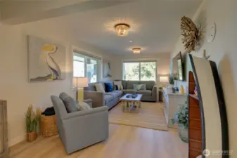 The sitting room is on the other side of the dining area.