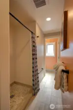 Main bath with beautiful tilework.