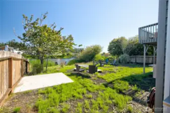 The back yard has privacy fencing from the neighbors, hot tub pads ready and disconnects on the house.  It would not take much effort to make an upgrade for each of the two units.