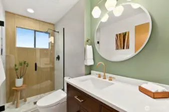 Brand New primary bathroom with new flooring, custom tile and vanity