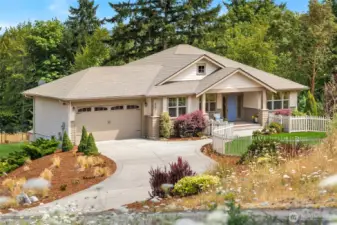 Welcome home to your new sanctuary! Located at the end of a quiet and private paved drive with water views.