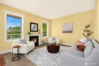 Cozy living room off of kitchen with gas fireplace.