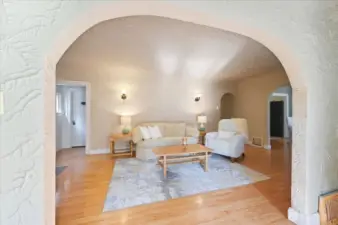 Coved Ceiling Leading to Living Room from Sitting Area