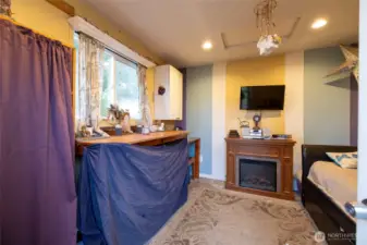 iside the tiny house, near the chicken coup