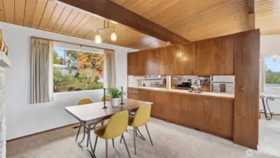 Architectural warmth meets livable comfort in this open-concept living and dining area.