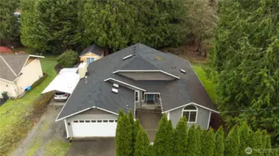 Established neighborhood with mature hedges for privacy! This home combines comfort and seclusion just a street from Lake Tapps.