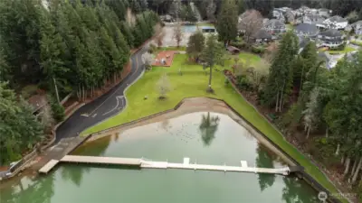 The community HOA benefits and amenities include: three lakeside parks and a ball field that is available for members only and their guests to use via their own key cards. There is a playground set, a private boat launch, pickle ball, tennis and volleyball courts, picnic areas with BBQ's, exclusive beach and swimming area at Jenks Park, a swimming area at Lakeridge Park, and an off leash dog area and walking trail at Banker’s Spit Park.