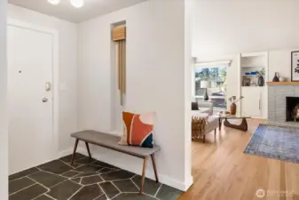 Welcome guest into lovely entry with period piece stone.