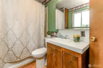 Full Bath at bottom of stairs