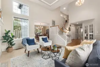 Another view shows the dining room in the center of the photo, just off the kitchen.