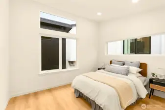 Across the hall, the secondary bedroom