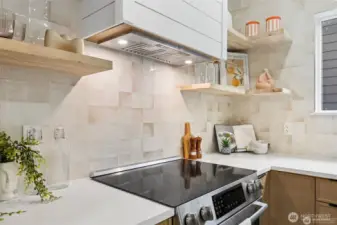 Quartz countertops with backsplash to ceiling