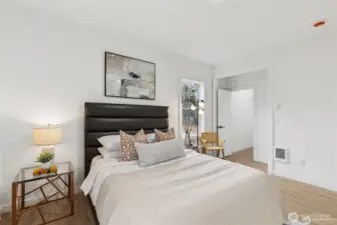 Primary bedroom on the main floor with ensuite bathroom, walk-in closet.