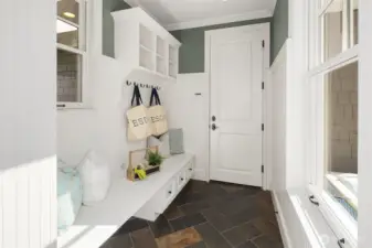 Mudroom off garage and kitchen.
