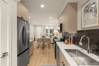 The sleek cabinetry and quality finishes create a stylish yet highly functional cooking space.