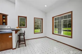 Good sized informal dining space with door to the covered patio