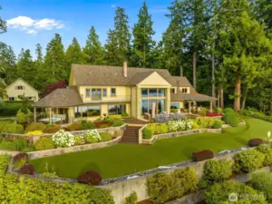 Spectacular home set high on a bluff with 180 degree saltwater views from the NW to the SW.