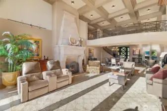 Unique marbled propane fireplace for warmth and ambiance. Note the tall ceilings and decor' light imbedded panels.