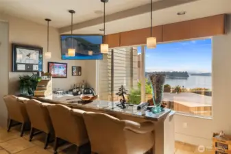Sunken wet bar, twin dishwashers, full bar appointments and the never ending water views