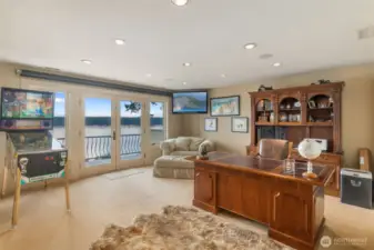 Executives workspace with french doors to the 2nd story viewing deck.
