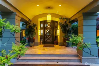 Majestic entryway. Stone, tile features and courtyard