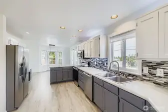 Generous counter space, pantry storage, and a sink upgrade you didn’t know you needed -  built-in bottle rinser for modern convenience.  This kitchen is built for everyday ease