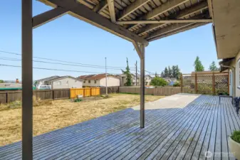 Spacious patio ready for BBQs, cozy evenings, and effortless outdoor living