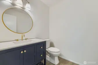 Guest half bath remodeled with contemporary touches