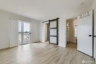 Spacious primary suite with sliders to a private deck, wake up to sweeping views of the Cascade Mountain Range